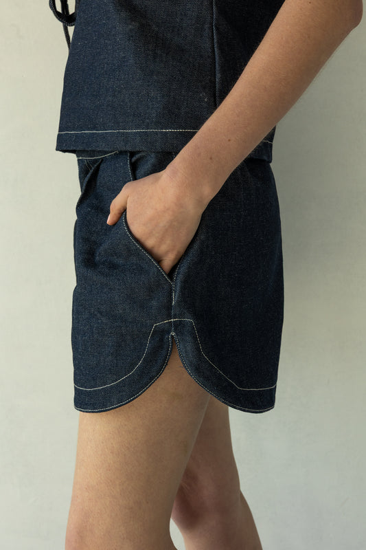 Rokkie Denim 09 / 04 Short — high-waisted short, curved hem at the side seam